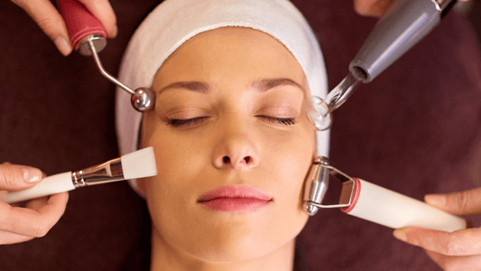 Various med spa treatments are be being used a one time on a woman's face.