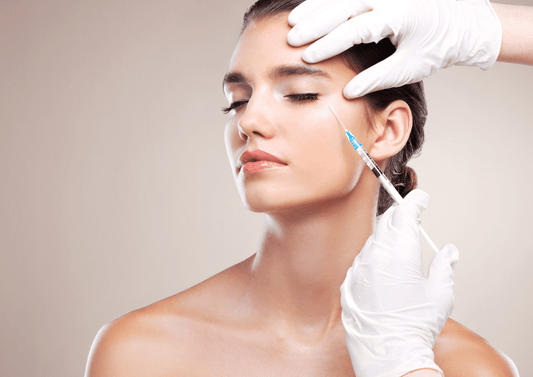 a woman getting Sculptra injections 